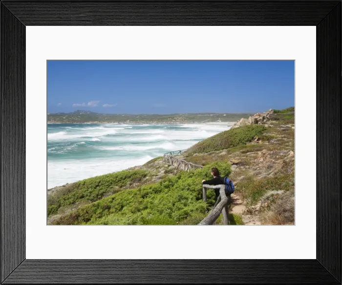 Framed Print : Woman at a path along the west coast at the beach of Rena Maiore, Sardinia, Italy Framed Print : Woman at a path along the west coast at the beach of Rena Maiore, Sardinia, Italy