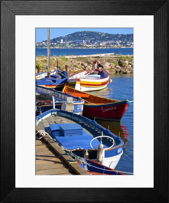 Framed Print : Old fishing boats, Etang de Thau Museum, Bouzigues, Thau basin, Sete town in the background, Herault, Languedoc, France, Europe Framed Print : Old fishing boats, Etang de Thau Museum, Bouzigues, Thau basin, Sete town in the background, Herault, Languedoc, France, Europe
