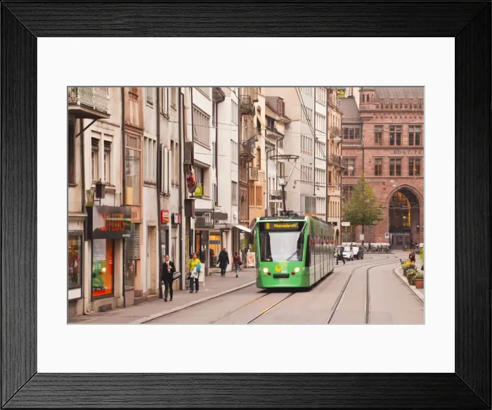 Framed Print : A tram runs down the streets of Basel in Switzerland, Europe Framed Print : A tram runs down the streets of Basel in Switzerland, Europe