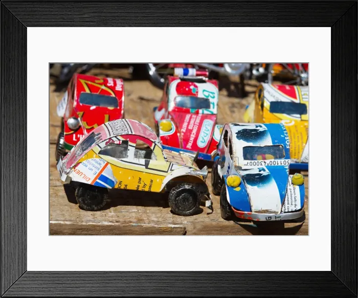 Framed Print : Toy cars made with metal food box and sold on the National 7 road, Madagascar, Africa Framed Print : Toy cars made with metal food box and sold on the National 7 road, Madagascar, Africa