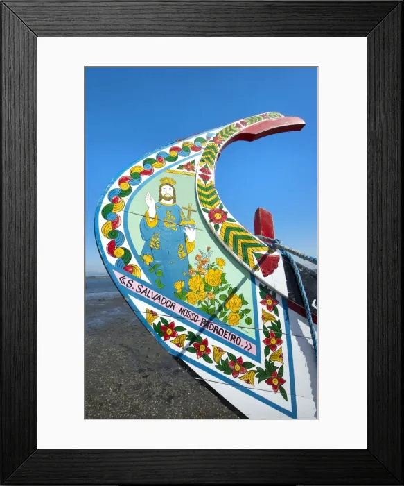 Framed Print : Colorful hand painted prow of a gondola-like moliceiro on the beach, Torreira, Aveiro, Beira, Portugal, Europe Framed Print : Colorful hand painted prow of a gondola-like moliceiro on the beach, Torreira, Aveiro, Beira, Portugal, Europe