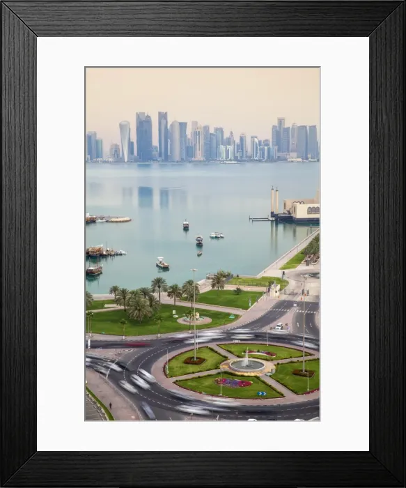 Framed Print : Traffic at roundabout in front of Museum of Islamic Art with West Bay skyscrapers in background, Doha, Qatar, Middle East Framed Print : Traffic at roundabout in front of Museum of Islamic Art with West Bay skyscrapers in background, Doha, Qatar, Middle East