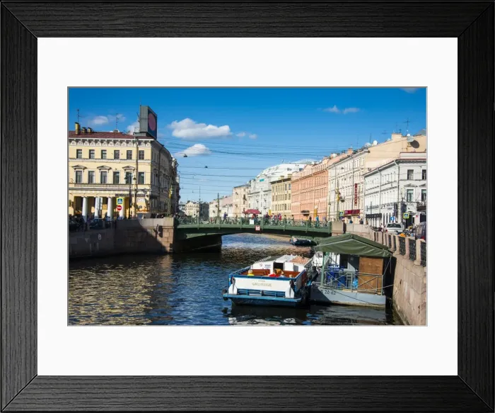 Framed Print : Tourist boat on a water channel in the center of St. Petersburg, Russia, Europe Framed Print : Tourist boat on a water channel in the center of St. Petersburg, Russia, Europe