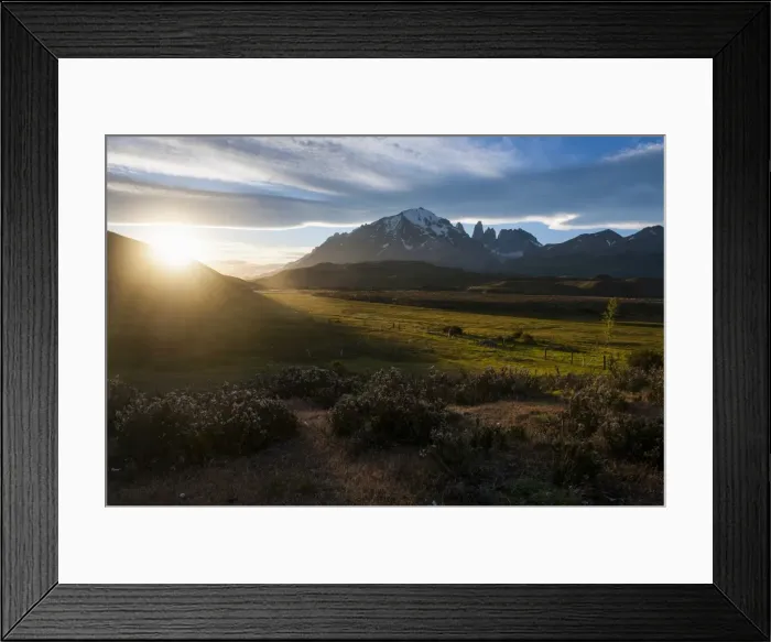Framed Print : Late sunrays breaking through the clouds before the towers of the Torres del Paine National Park, Patagonia, Chile, South America Framed Print : Late sunrays breaking through the clouds before the towers of the Torres del Paine National Park, Patagonia, Chile, South America