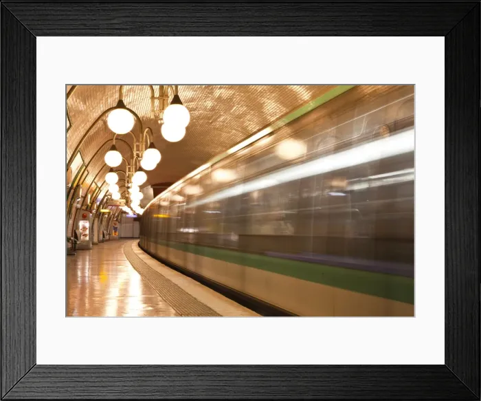 Framed Print : A Paris metro train leaves Cite station, Paris, France, Europe Framed Print : A Paris metro train leaves Cite station, Paris, France, Europe