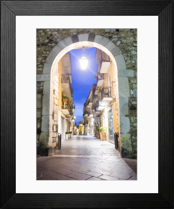 Framed Print : Porta Catania, one of the entrances to Corso Umberto, the main street in Taormina at night, Sicily, Italy, Europe Framed Print : Porta Catania, one of the entrances to Corso Umberto, the main street in Taormina at night, Sicily, Italy, Europe