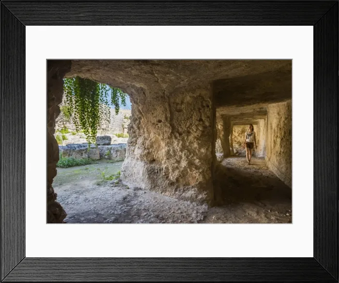 Framed Print : Tourist exploring the tunnels at the Greek ruins, Eurialo Casle (Castello Eurialo), Syracuse (Siracusa), Sicily, Italy, Europe Framed Print : Tourist exploring the tunnels at the Greek ruins, Eurialo Casle (Castello Eurialo), Syracuse (Siracusa), Sicily, Italy, Europe