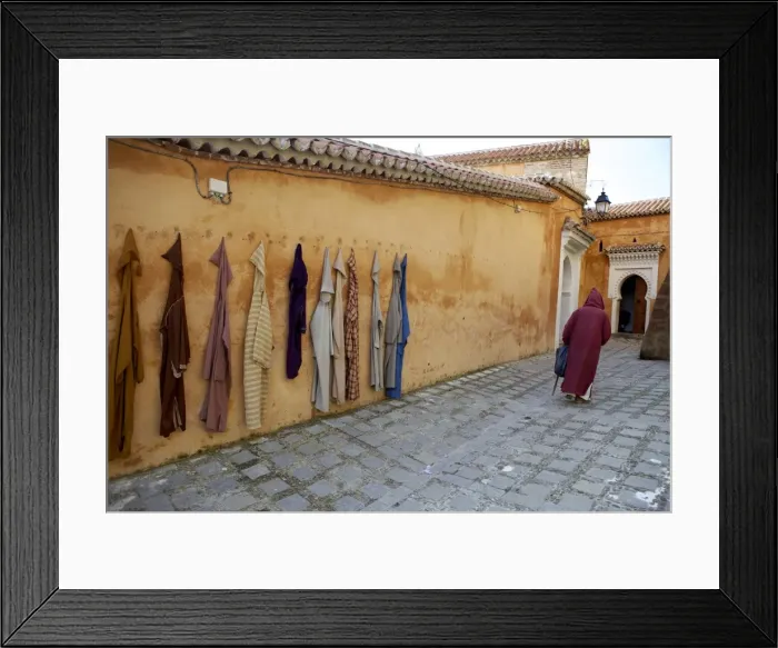 Framed Print : Djellaba garments hanging on a wall, Chefchaouen, Morocco, North Africa, Africa Framed Print : Djellaba garments hanging on a wall, Chefchaouen, Morocco, North Africa, Africa