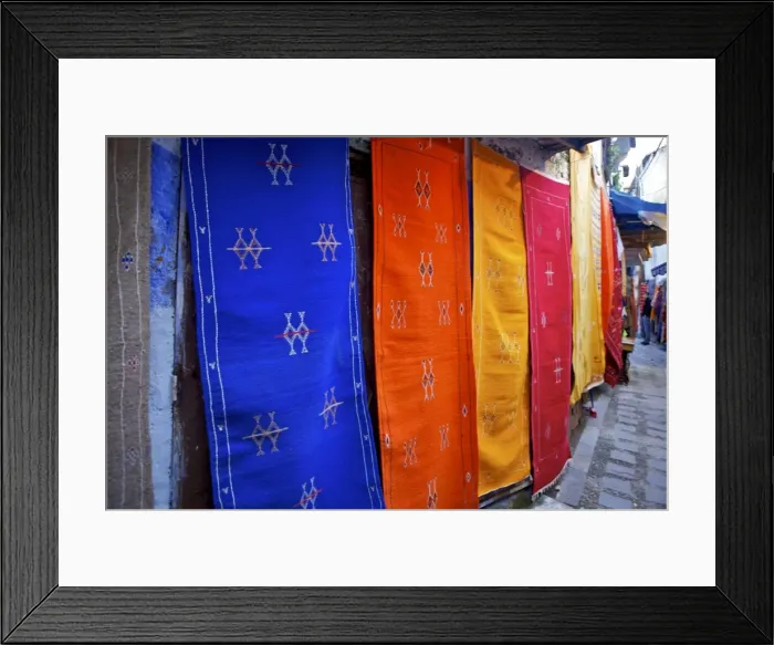 Framed Print : Rugs hung on the wall in Chefchaouen, Morocco, North Africa, Africa Framed Print : Rugs hung on the wall in Chefchaouen, Morocco, North Africa, Africa
