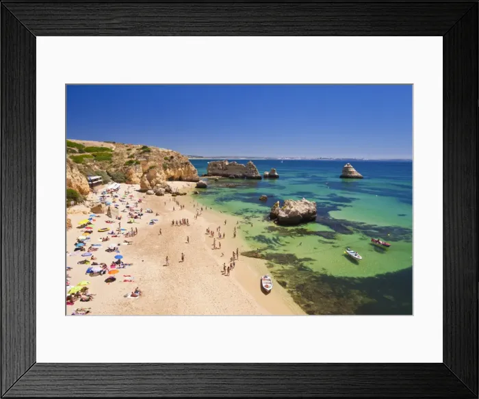 Framed Print : Holidaymakers sunbathing on Praia da Dona Ana, sandy beach near the resort of Lagos, Algarve, Portugal, Europe Framed Print : Holidaymakers sunbathing on Praia da Dona Ana, sandy beach near the resort of Lagos, Algarve, Portugal, Europe