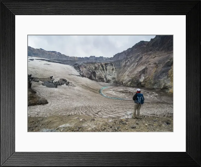 Framed Print : Tourist standing on a glacierfield on Mutnovsky volcano, Kamchatka, Russia, Eurasia Framed Print : Tourist standing on a glacierfield on Mutnovsky volcano, Kamchatka, Russia, Eurasia