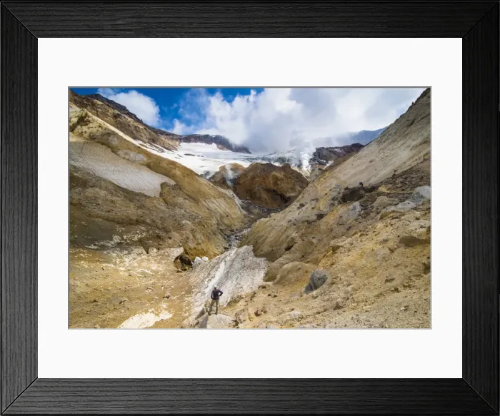 Framed Print : Tourist looking at smoking fumaroles on Mutnovsky volcano, Kamchatka, Russia, Eurasia Framed Print : Tourist looking at smoking fumaroles on Mutnovsky volcano, Kamchatka, Russia, Eurasia