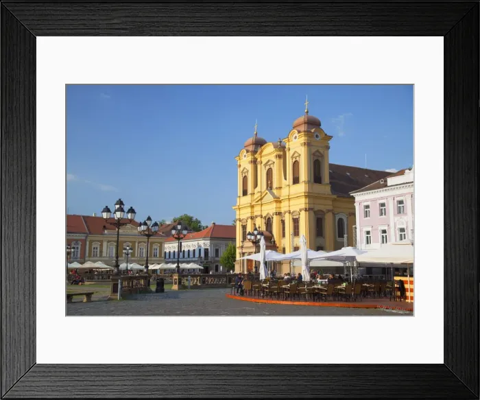 Framed Print : Roman Catholic Cathedral and outdoor cafes in Piata Unirii, Timisoara, Banat, Romania, Europe Framed Print : Roman Catholic Cathedral and outdoor cafes in Piata Unirii, Timisoara, Banat, Romania, Europe