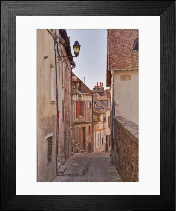 Framed Print : A narrow street of half timbered houses in the town of Joigny, Yonne, Burgundy, France, Europe Framed Print : A narrow street of half timbered houses in the town of Joigny, Yonne, Burgundy, France, Europe