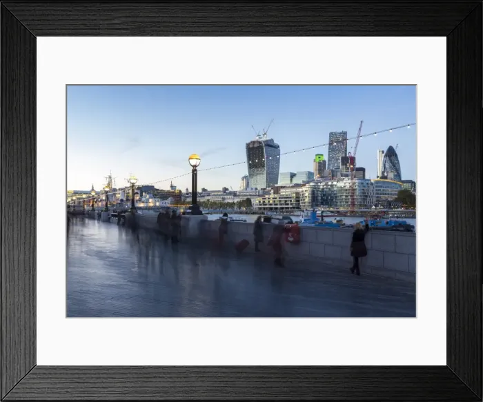 Framed Print : Tourists walking along the South Embankment of the River Thames at London Bridge, with the Gherkin and other skyscrapers amongst the City of London skyline, London, England, United Kingdom, Europe Framed Print : Tourists walking along the South Embankment of the River Thames at London Bridge, with the Gherkin and other skyscrapers amongst the City of London skyline, London, England, United Kingdom, Europe