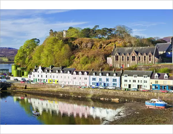 Multi-coloured houses with reflections in Portree harbour, Isle of Skye, Inner Hebrides, Highlands and Islands, Scotland, United Kingdom, Europe