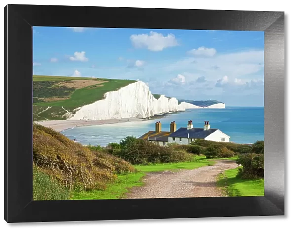 The Seven Sisters chalk cliffs and coastguard cottages, South Downs Way, South Downs National Park, East Sussex, England, United Kingdom, Europe