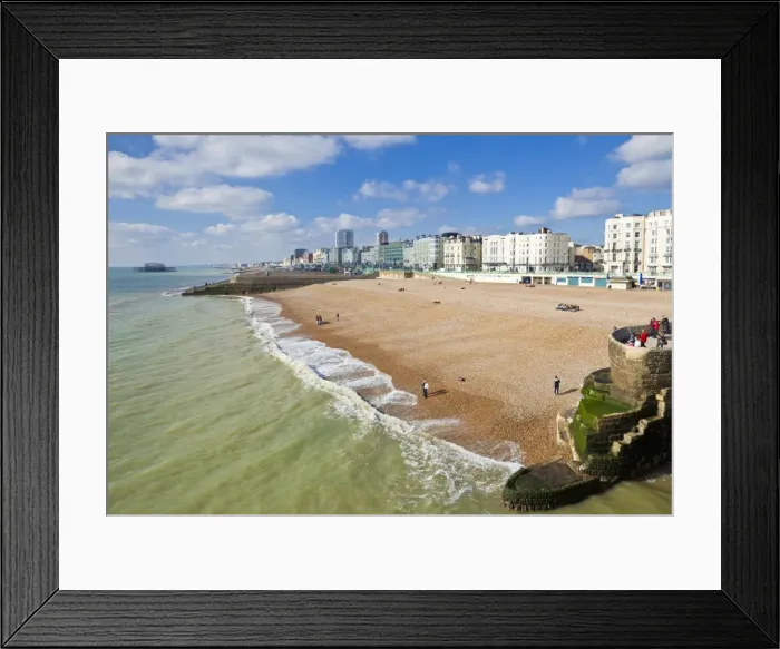 Framed Print : The seafront with people on the beach at Brighton Beach, East Sussex, England, United Kingdom, Europe Framed Print : The seafront with people on the beach at Brighton Beach, East Sussex, England, United Kingdom, Europe
