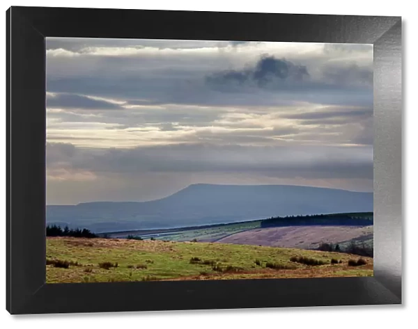 Stormy sky over Pendle Hill from above Settle, North Yorkshire, Yorkshire, England, United Kingdom, Europe