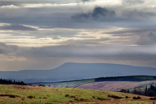 Stormy sky over Pendle Hill from above Settle, North Yorkshire, Yorkshire, England, United Kingdom, Europe