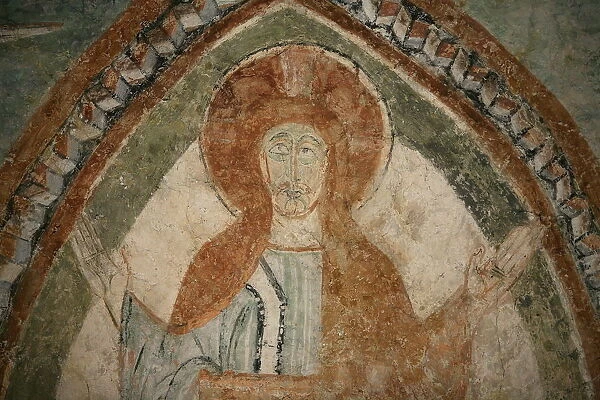 A 12th century Romanesque fresco depicting Jesus Christ, St