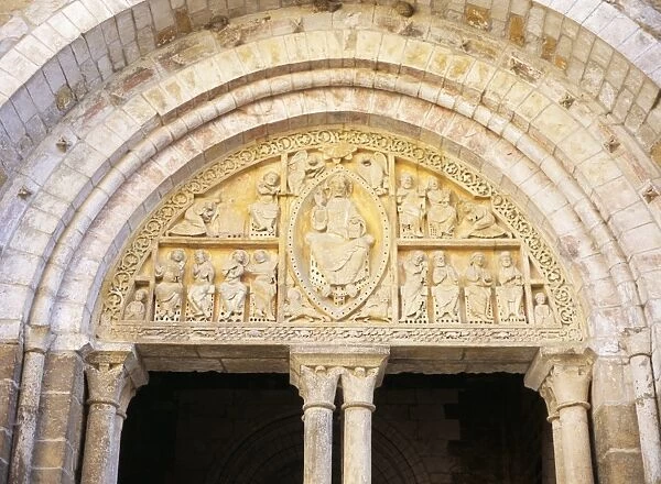 12th century tympanum above entrance to Eglise St. Pierre (St. Peters church)