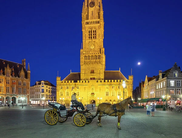 The 13th century Belfort van Brugge belfry tower on the Markt square, at dusk, Bruges (Brugge)