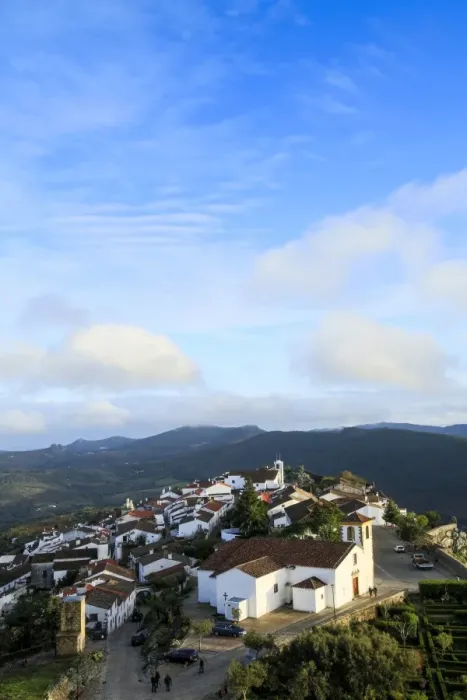 Framed Print : The 15th century parish church, medieval town and the Serra do Sao Mamede mountains