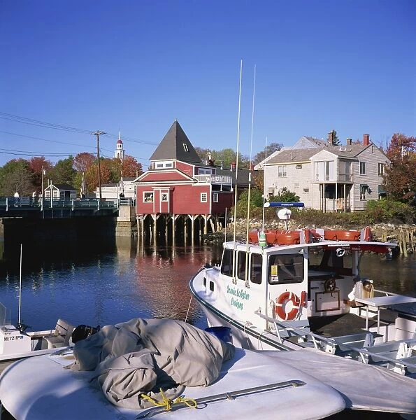 485-2598. Cruise boat in harbour with wooden buildings on the waterfront at Kennybunkport