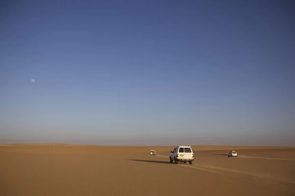 Three 4x4 vehicles in the Fezzan desert, Libya, North Africa, Africa