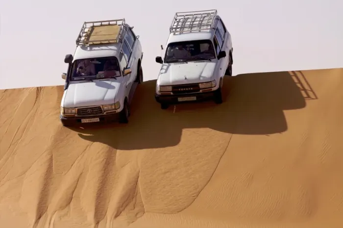 Framed Print : Two 4X4s on the dunes of the erg of Murzuk in the Fezzan Desert, Libya Framed Print : Two 4X4s on the dunes of the erg of Murzuk in the Fezzan Desert, Libya