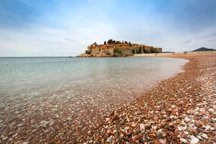 Framed Print : The 5-star hotel resort of Aman Sveti Stefan set on a small islet on the Adriatic coast Framed Print : The 5-star hotel resort of Aman Sveti Stefan set on a small islet on the Adriatic coast