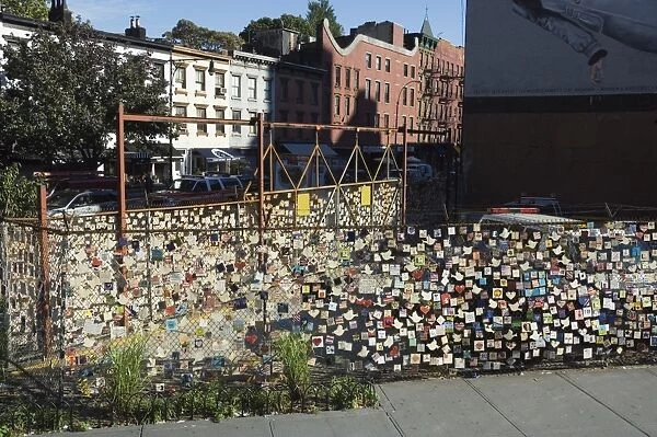 9  /  11 Messages on tiles on fence in Greenwich Village
