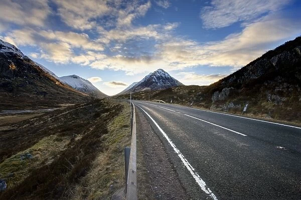 A82 trunk road heading across Rannoch Moor towards Glencoe with snow-covered mountains in distance