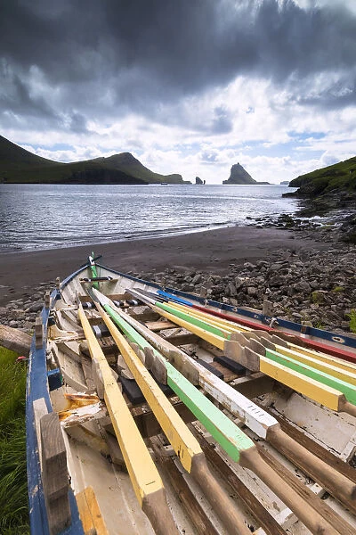 Abandoned boat on the beach, Bour, Vagar Island, Faroe Islands, Denmark, Europe