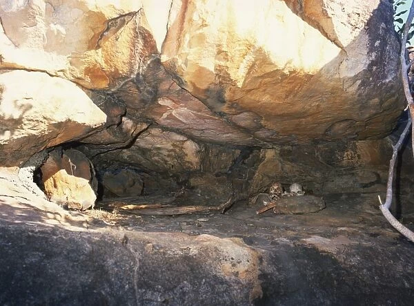Aboriginal burial in rock cavity, with roof painting, near King Edward River