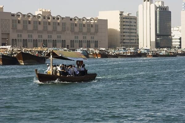 An abra (ferry) crossing Dubai Creek