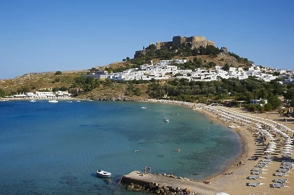 Acropolis and village, Lindos beach. Lindos, Rhodes, Dodecanese, Greek Islands, Greece, Europe