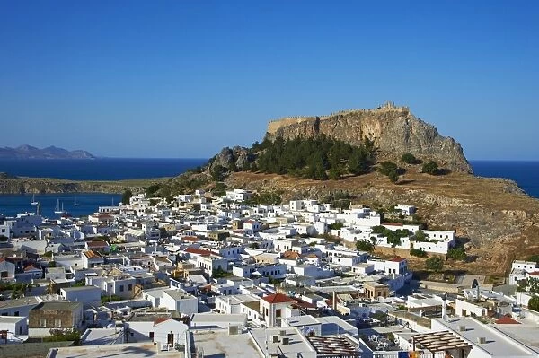Acropolis and village, Lindos, Rhodes, Dodecanese, Greek Islands, Greece, Europe