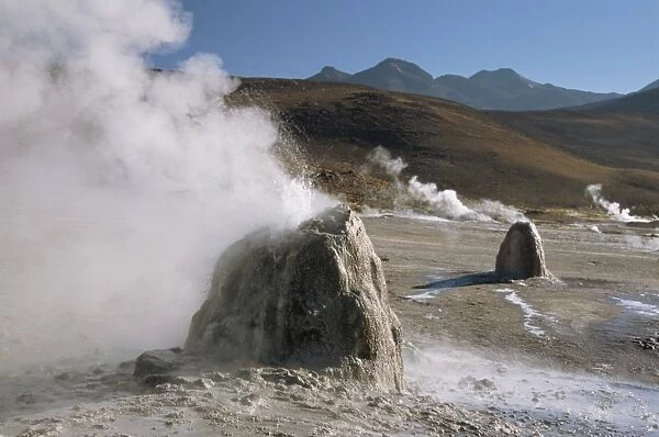 Active geysers on geyserite domes, El Tatio geyser basin on altiplano, Atacama Desert