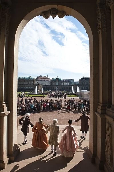Actors in period dress at the Zwinger Palace, Dresden, Saxony, Germany, Europe