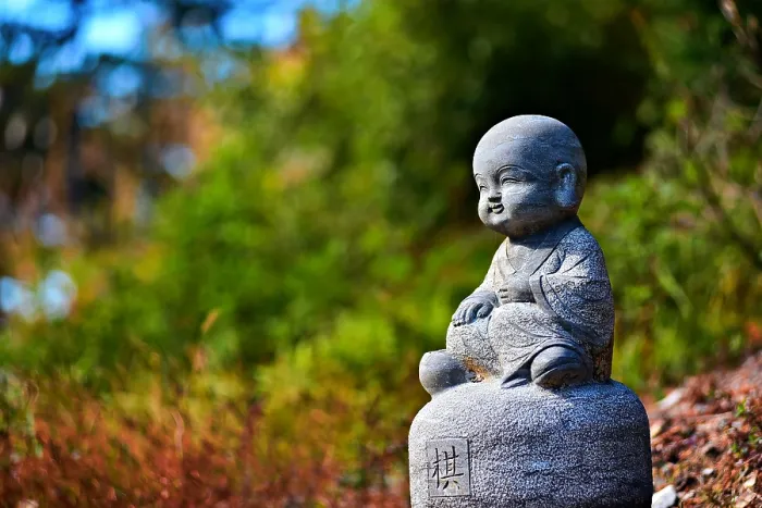 Framed Print : Adorable stone sculpture of a child monk in Nuona Pagoda Temple, aka Small Heavenly Pool Temple, a Tibetan Temple in Lushan (Mount Lu), Jiujiang City, Jiangxi, China Framed Print : Adorable stone sculpture of a child monk in Nuona Pagoda Temple, aka Small Heavenly Pool Temple, a Tibetan Temple in Lushan (Mount Lu), Jiujiang City, Jiangxi, China