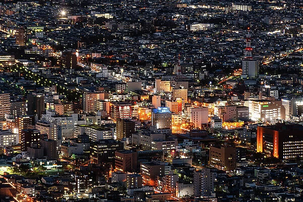 Aerial of city centre skyline at night, Hakodate, Hokkaido, Japan, Asia