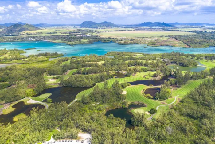 Framed Print : Aerial by drone of golf courses in the lush vegetation of the tropical lagoon, Ile Framed Print : Aerial by drone of golf courses in the lush vegetation of the tropical lagoon, Ile