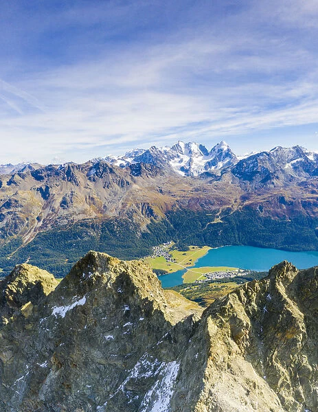 Aerial by drone of Lake Silvaplana and Bernina mountain range in summer, Engadine
