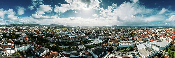 Aerial drone panoramic view of Braga, known for its religious heritage including Bom Jesus do Monte complex, and medieval Braga Cathedral, home to a Sacred Art Museum and Gothic-style Kings Chapel, Braga, Minho, Portugal, Europe