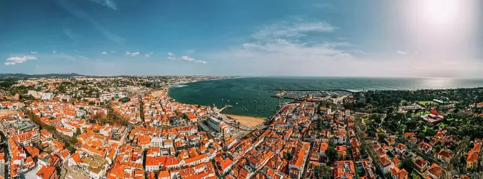 Framed Print : Aerial drone panoramic view of Cascais historic centre with the iconic Bay and Ribeira Beach, 30km west of Lisbon on the Portuguese Riviera, Cascais, Portugal, Europe