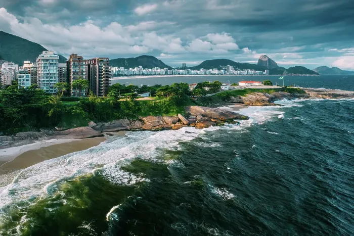 Framed Print : Aerial drone view of Arpoador section of Ipanema Beach with Copacabana and Sugarloaf Mountain visible in the background, Rio de Janeiro, Brazil, South America Framed Print : Aerial drone view of Arpoador section of Ipanema Beach with Copacabana and Sugarloaf Mountain visible in the background, Rio de Janeiro, Brazil, South America
