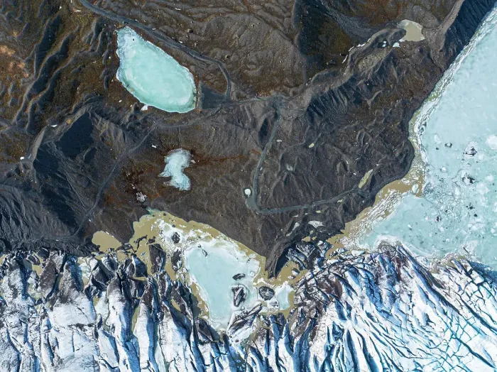 Framed Print : Aerial drone view of particular ice textures formed in the Svinafellsjokull glacier following global warming, Iceland, Polar Regions Framed Print : Aerial drone view of particular ice textures formed in the Svinafellsjokull glacier following global warming, Iceland, Polar Regions