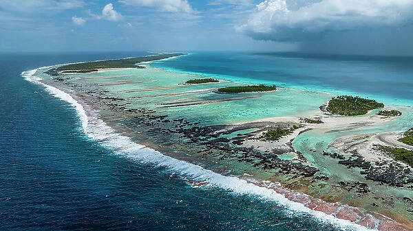 Aerial of the elevated reefs of Ile aux Recifs, Rangiroa atoll, Tuamotus, French Polynesia, South Pacific, Pacific